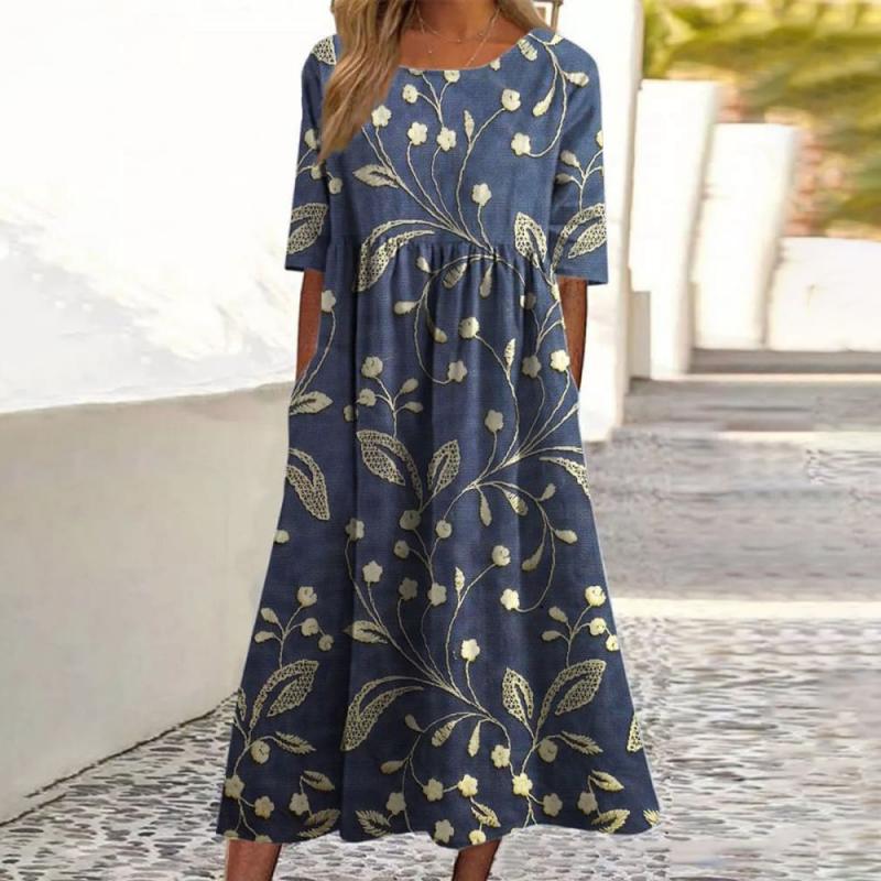 Mandy | Midi-jurk met bloemenprint en moeiteloze buikbedekking